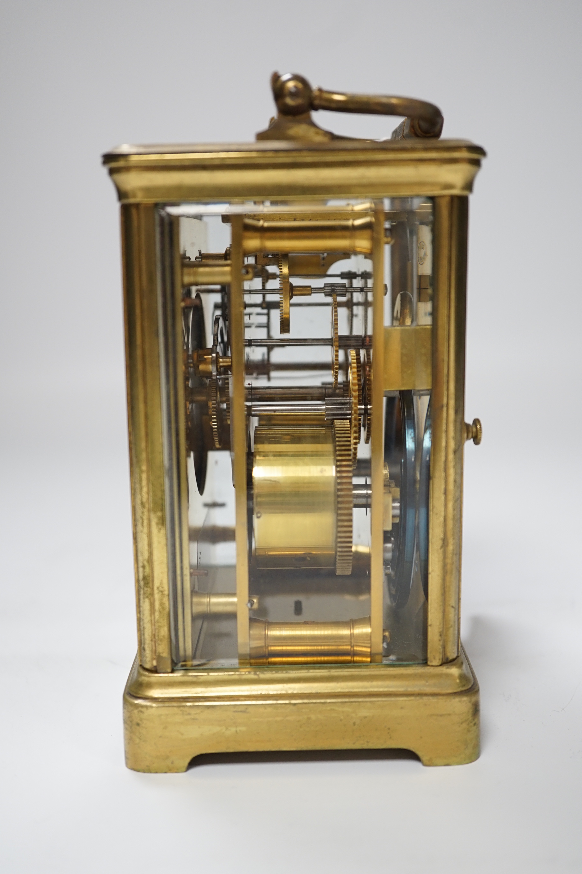 A brass carriage clock, dial signed Bechtler Allahabad, striking on a coiled gong, 13.5cm high